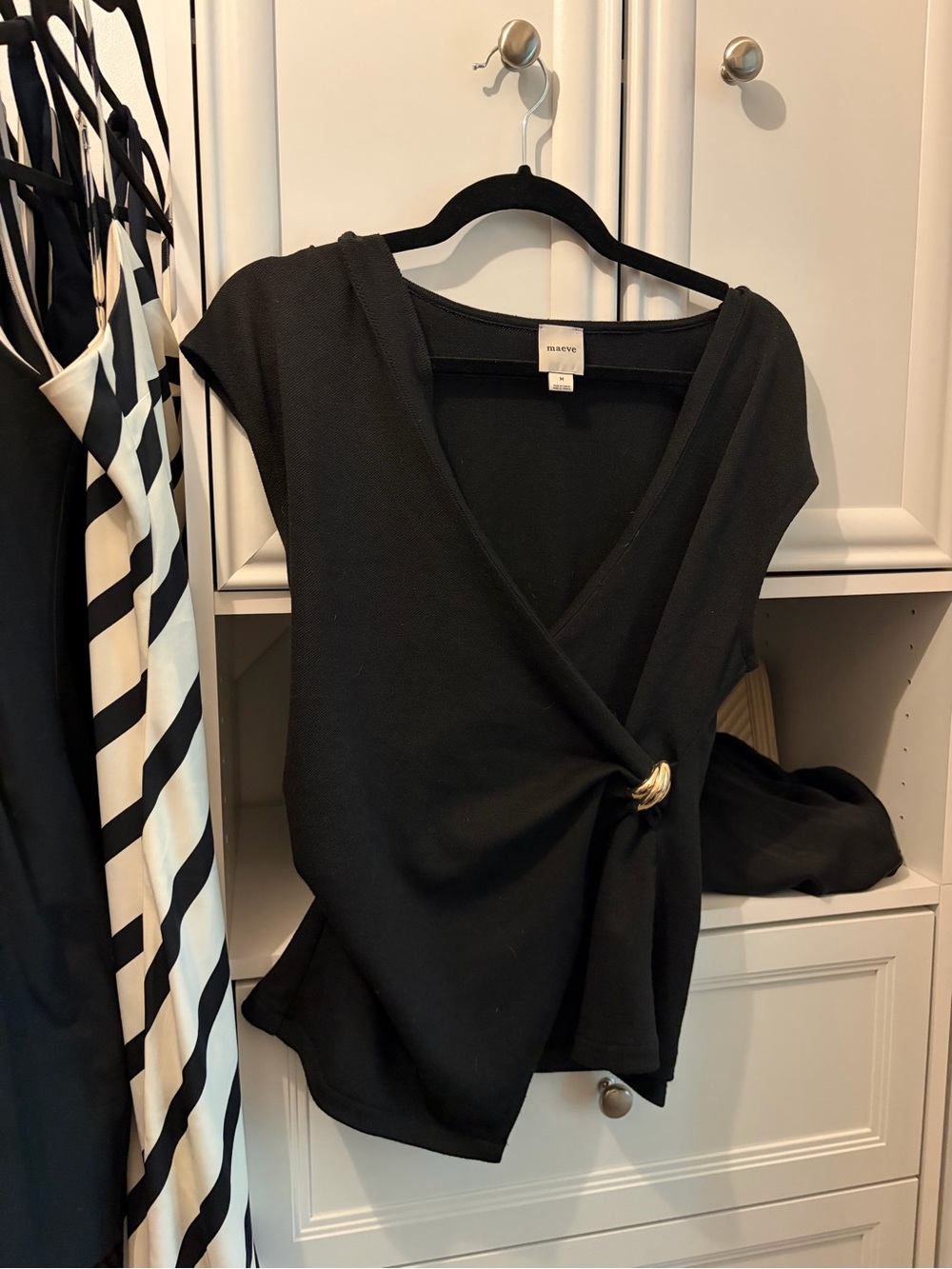 Maeve Black Wrap Top with Gold Ring Accent
